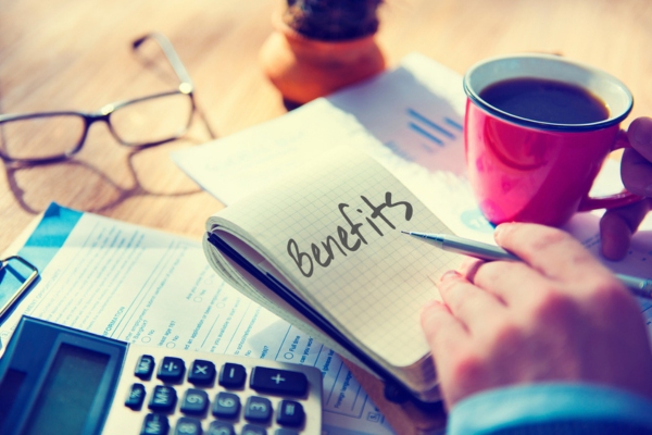 Benefits written on a notepad depicting ductless air conditioning units