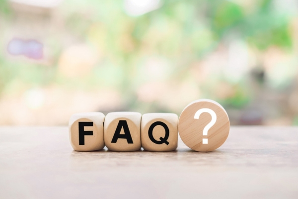 FAQ spelled using wooden letter dice depicting questions about automatic vs will call propane delivery