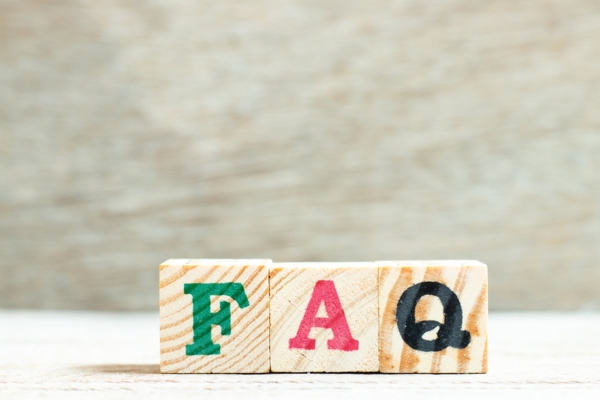 FAQ spelled using wooden letter cubes depicting questions about Air Conditioning Safety and Maintenance
