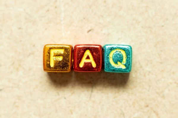 FAQ spelled using colorful metallic beads depicting questions about Will Call vs Automatic Oil Delivery