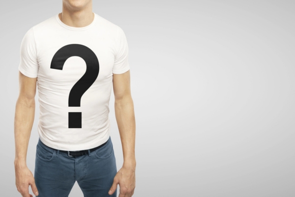 cropped view of a man with a question mark print on his shirt depicting FAQs about Furnace Preparation Tips