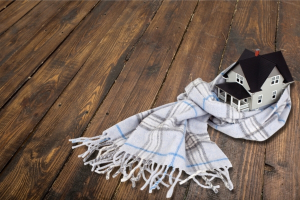 scarf around a miniature house Smarter Oil Heat_ Maximizing Efficiency In 2026