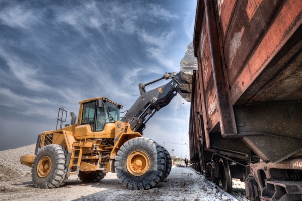 Excavator loader with backhoe on a construction site