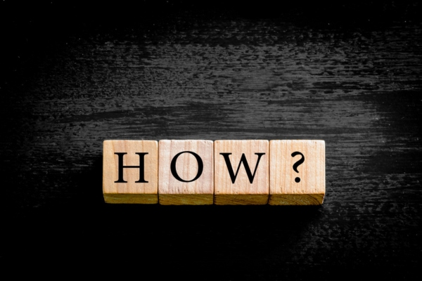 HOW Spelled using wooden letter cubes depicting how Marine Fuel Providers Are Adapting