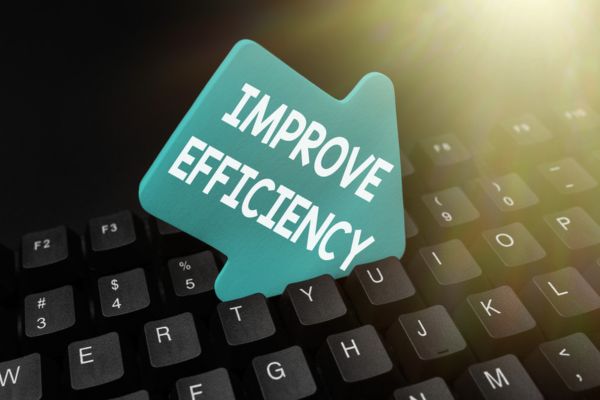 small arrow sign that says IMPROVE EFFICIENCY on a keyboard depicting marine fuel