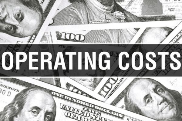OPERATING COSTS text black and white with dollar bills as background