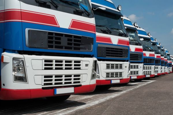 mage of diesel trucks fleet parked beside each other