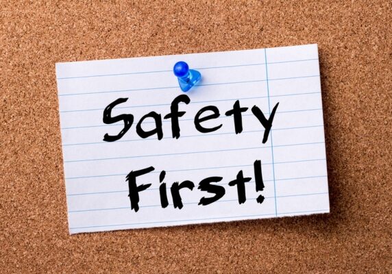 safety first written on torn paper pinned on a corkboard depicting air conditioning safety